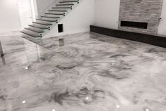 Epoxy Coating Ontario Epoxy Floor Marble Look, Butcher Block Countertops With Concrete Floors, Marbled Concrete Floor, Epoxy Marble Floor, Epoxy Resin Floor Ideas, Marbles For Flooring, Epoxy Floors In Home Living Room, Epoxy Kitchen Floor