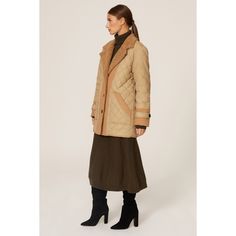 Brown faux shearling (100% Polyester). Reversible jacket. Long sleeves. Front button closure. 33.5" from shoulder to hemline. Made in the USA of imported materials. Chic Quilted Jacket For Fall Workwear, Fall Brown Outerwear With Contrast Collar, Chic Winter Outerwear With Contrast Collar, Fall Outerwear With Contrast Collar For Work, Fall Workwear Outerwear With Contrast Collar, Shearling Long Sleeve Outerwear For Fall, Winter Outerwear With Corduroy Collar, Fall Shearling Outerwear With Button Closure, Winter Outerwear With Corduroy Collar For Workwear