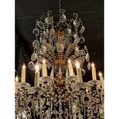 a chandelier hanging from the ceiling in a room