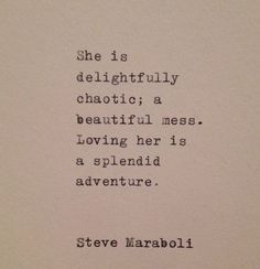 an old typewriter with the words she is delightfully chaotic a beautiful mess loving her is a splendid adventure