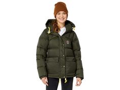 Fjallraven Expedition Down Lite Jacket - Women's Coat : Deep Forest : Enjoy the outdoors in the Fjällräven Expedition Down Lite Jacket. With its lightweight material, it is the perfect must-have for milder winter climates. Shoulders are reinforced with synthetic padding to prevent moisture and pressure. Outer fabric in hardwearing polyamide with PFC-free DWR (durable water repellent) Wind resistant, water-resistant. Snap-flap hand pockets with vertical zips. Inner stash pockets. Adjustable drawc Winter Long Sleeve Hiking Outerwear, Long Sleeve Winter Hiking Outerwear, Khaki Puffer Jacket For Fall Outdoor Activities, Khaki Puffer Jacket For Fall Outdoor, Insulated Long Sleeve Outerwear For Fall, Fall Hiking Khaki Outerwear, Casual Insulated Parka For Fall, Khaki Fall Hiking Outerwear, Green Utility Outerwear For Outdoor