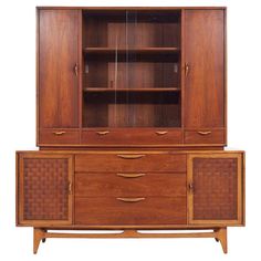 a wooden cabinet with two doors and drawers