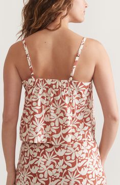 Tropical flowers make a cheery splash across this hemp-blend cami fashioned with a button placket. Front button closure V-neck Adjustable straps 54% hemp, 44% Tencel® lyocell, 2% spandex Tencel lyocell is a more-sustainably produced fiber made with closed-loop processing Machine wash, dry flat Imported V-neck Linen Tops With Floral Print, Floral Print Linen V-neck Top, Casual Rayon Camisole, Summer Linen Tops With Floral Print, Floral Print Linen Tops For Summer, Summer Floral Print Linen Tops, Summer Linen Top With Floral Print, Summer Floral Linen Top, Linen Tops With Adjustable Straps For Vacation