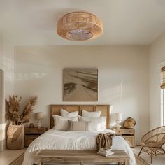 a bed sitting in a bedroom next to a wooden table and chair on top of a hard wood floor