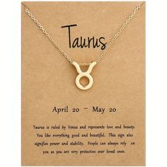 a necklace with the words tauns on it and an image of a zodiac sign