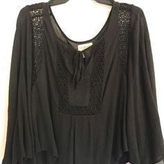 Black Long Sleeve Never Worn Black Flowy Summer Blouse, Bohemian Black Tops For Night Out, Black Bohemian Top For Night Out, Flowy Black Long Sleeve Top, Chic Black Rayon Blouse, Black Rayon Summer Blouse, Black Rayon Blouse For Summer, Spring Black Flowy Blouse, Black Flowy Blouse For Spring