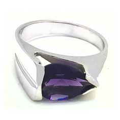 Carat: 14k White Gold (Not Plated) Gemstones: 1 Genuine Amethyst - 1.78 Carats Amethyst Grades, Hue . . . Violet/Purple Tone . . . Medium Saturation . . . Vivid No Inclusions Or Flaws Shape: Pear Net Weight: 4 Grams Type Of Setting: Prong Dimensions: 10 Mm X 7 Mm - Amethyst Measurements Finger Size: 6 (Free Resizing Service To Any Finger Size - If Needed) Modern Formal Gemstones With Polished Finish, Modern Sterling Silver Amethyst Ring For Formal Occasions, Polished Amethyst Gemstones For Formal Occasions, Formal Polished Amethyst Gemstones, Modern Sterling Silver Amethyst Ring, Modern Sterling Silver Amethyst Ring With Polished Finish, Modern White Gold Amethyst Ring As Gift, Modern White Gold Amethyst Ring Gift, Modern Amethyst Ring As Gift