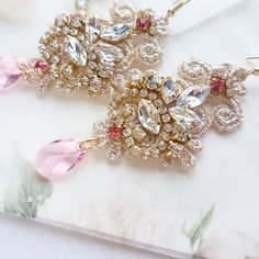 Chandelier statement wedding earrings. Hand embroidered with rhinestone on Venice lace, topped with lovely crystals. Earrings are very light and comfortable to wear, you can order matching bracelet and hair pins (separately). You can as well order earrings in other rhinestone crystals. This earrings will be shipped nicely packed in the gift box. For other wedding jewelry visit my shop; https://www.etsy.com/shop/byPiLLowDesign Order Earrings, Boho Wedding Earrings, Wedding Earrings Chandelier, Pink Crystal Earrings, Statement Earrings Wedding, Crystals Earrings, Bridal Earrings Chandelier, Hippie Earrings, Gold And Pink