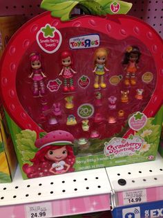 the strawberry shortcakes toys are on display for kids to buy at walmart