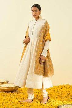 Glaze mustard dupatta with Kashmiri tilla embroidery in floral, paisley motifs and bead work hem.
Component: 1
Pattern: Embroidered
Type Of Work: Tilla
Fabric: Raw Silk
Color: Yellow
Other Details: 
Note: Kurta and pant worn by the model is not for sale
Occasion: Wedding,Mehendi - Aza Fashions Kashmiri Tilla Embroidery, Destination Wedding Colors, Tilla Embroidery, Wedding Mehendi, Paisley Motifs, Desi Clothes, Embroidered Dupatta, Sharara Set, Designer Gowns