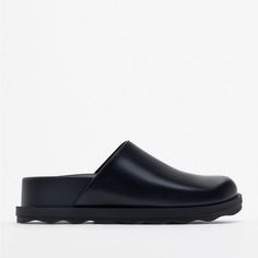 Black Clogs, Similar To A Birkenstock Dupe Casual Synthetic Clogs With Lug Sole, Black Clogs With Lug Sole And Round Toe, Black Clogs With Cushioned Footbed And Flat Heel, Modern Black Clogs For Spring, Black Clogs With Textured Sole For Spring, Modern Clogs With Lug Sole And Round Toe, Casual Mules With Round Toe And Lug Sole, Casual Black Mules With Textured Sole, Modern Black Clogs With Removable Insole