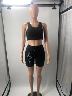 Sportswear Sleeveless Crop Top Drawstring Shorts 2pcs Black Cotton Sports Bra For Summer, Summer Cotton Sports Bra For Loungewear, Summer Leisure Activewear With Drawstring, Casual Sleeveless Sports Bra For Summer, Casual Sleeveless Summer Sports Bra, Casual Short Tank Top For Workout, Sleeveless Stretch Activewear For Leisure, Summer Sleeveless Sports Bra For Loungewear, Casual Tank Sports Bra For Loungewear