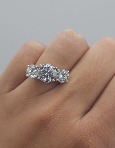 This is a beautiful 3 stone Lab Grown diamond ring. It is set in real solid 14Kt Gold. You can choose if you want 14Kt White Gold, 14Kt Yellow Gold or 14Kt Rose Gold.  We have a lot of beautiful jewelry with natural diamonds. If any listing states "diamond" then it is a natural diamond. If the listing states "Lab Grown" it is a Lab Grown diamond. This is the perfect gift for mom, wife, fiancee, girlfriend, valentine, daughter, family or friend. It is a special gift for mother's day, valentine's Moissanite Three Stone Diamond Ring, Three Stone Moissanite Wedding Ring With Round Band, Moissanite Three Stone Round Band For Wedding, Fine Jewelry Moissanite Three Stone Diamond Ring, Three Stone Moissanite Round Band For Wedding, Three Stone Lab Grown Diamond Wedding Ring, Lab Grown Diamond Three Stone Ring, Three Stone Lab Grown Diamond Jewelry For Promise Ring, Moissanite Three Stone Round Band Wedding Ring