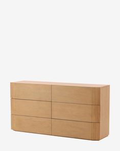 the sideboard is made from wood and has four drawers