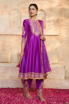 Purple anarkali in dupion base with floral pattern gota embroidered yoke, cuffs, hem and fringed lace details. Comes with matching dupion salwar and dupatta. - Aza Fashions Reception Chanderi Salwar Kameez With Dori Work, Chanderi Salwar Kameez With Dori Work For Reception, Art Silk Kurta For Navratri Reception, Art Silk Kurta For Reception And Navratri, Traditional Drape Churidar With Gota Work For Reception, Traditional Churidar With Gota Work For Reception, Reception Churidar With Gota Work And Traditional Drape, Churidar With Dori Work For Reception, Fitted Slub Silk Salwar Kameez With Cutdana