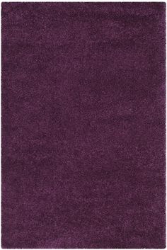 a purple area rug with a white border on the top and bottom part of it