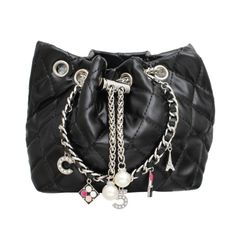 Silver Link Chain Pointed Quilted Black Faux Leather Mini Fashion Accessory Bucket Handbag Purse Silver Metal Hardware Bag Size : 6" X 5.5" X 3.5" Strap Size: 43" L / Detachable Top Handle Chain Size: 1.25" H, 10.5" L Rhinestone Crystal And Enamel Charms: C , 5, Eiffel Tower, Makeup Pallet, Lipstick Luxury Fashion Statement Accessories Bag Theme : Pearl R 1048 B Chic Evening Bag With Silver Chain, Black Evening Bag With Chain, Trendy Black Evening Bag With Chain, Chic Black Evening Bag With Silver-tone Hardware, Parisian Boutique, Luxury Lipstick, Mini Bucket Bag, Chain Lock, Silver Link Chain