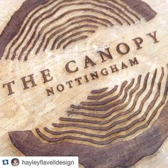 the logo for the canopy nottingham museum is shown in front of an image of a fingerprint