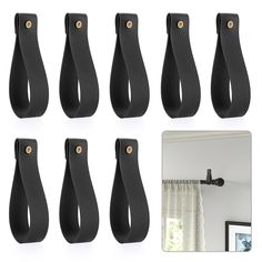 six pairs of black leather door handles