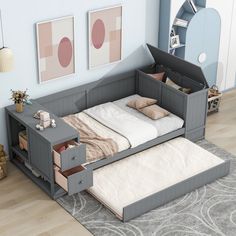 a bedroom with a bed and dresser in it