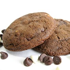 two cookies with chocolate chips on the side