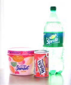 three different types of yogurt and drinks on a table