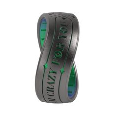 a black and green ring with the word pray on it