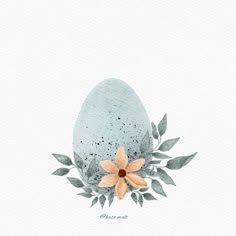 an egg with flowers and leaves on it is painted in watercolors by hand