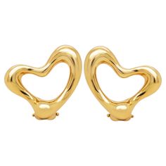 For Sale on 1stDibs - Tiffany & Co. Elsa Peretti 18K Yellow Gold Open Heart Clip On Earrings Earring are crafted in solid 18k yellow gold. Earrings measures 0.83 inch length Tiffany And Co Earrings, Goth Wardrobe, 2024 Logo, Open Heart Earrings, Spanish Modern, Square Diamond Rings, Jewelry Tiffany, Heart Clip, Tiffany Earrings