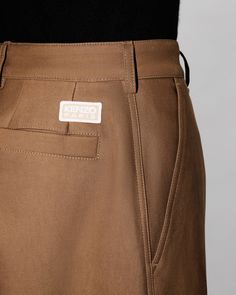 Tapered workwear straight pants.
KENZO Paris label placed on the back.
Unlined.
Two side pockets.
One phone pocket.
One coin pocket. Classic Bottoms With Cargo Pockets And Straight Hem, Classic Cargo Pants With Pockets For Workwear, Classic Straight Hem Cargo Pants, Brown Chinos With Pockets And Straight Hem, Classic Straight Cargo Pants With Pockets, Classic Cargo Pants With Side Pockets, Classic Cargo Pants With Patch Pockets And Tapered Leg, Wide-leg Cargo Pants For Work With Hip Pockets, Workwear Chinos With Straight Hem And Belt Loops