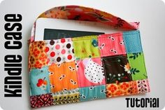 an ipad case made out of patchwork fabric with the words kindle case on it