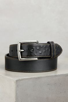 Made from genuine American bison leather with rich, ostrich-embossed cowhide overlays, the hardworking Hidalgo belt offers a handsome finish to your everyday wear. A square, distressed silver buckle stylishly sets off the rounded, western-inspired overlay accent, while contrast stitching throughout lends visual appeal. Featuring a tapered tip, single leather keeper, and calfskin lining. Bison Leather, American Bison, Contrast Stitch, Belt Size, Leather Belt, Calf Skin, Everyday Wear, Stitching, Buckle