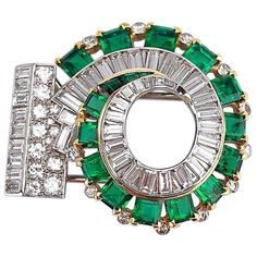 Cartier 1930s Platinum and 18KT, 6.53Ct. Emerald and Diamond Swirl Clip Brooch | From a unique collection of vintage Brooches at https://www.1stdibs.com/jewelry/brooches/brooches/. Cartier Art Deco, Art Deco Diamond Brooch, Cartier Panthere, Cartier Jewelry, Diamond Brooch, Expensive Jewelry, Art Deco Diamond, Emerald Jewelry, Van Cleef