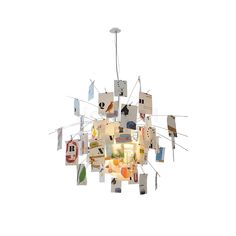 a multi - tiered chandelier with pictures hanging from it's sides