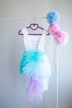 This Pinkie Pie Inspired Tutu dress is perfect for Birthday party, Halloween party and Dress up The dress is made with high quality fabrics. Top of the dress: 100% cotton fabric Bottom of the dress: High quality lycra soft tulle fabric ( soft and not stiff) Lining: 100% cotton fabric There is a corset like closing at the back of the dress which lets to adjust the fit of the dress. There is an elastic band at the back of the waistband. The dress is easy to pull on and very adjustable. This dress Princess Style Mermaid Dress For Party, Princess Style Tulle Mermaid Dress For Party, Fitted Tulle Princess Mermaid Dress, Fitted Tulle Mermaid Dress For Dress-up, White Mermaid Dress For Party, Whimsical Mermaid Tutu Dress For Parties, Whimsical Mermaid Princess Dress For Party, Whimsical Tulle Tutu Dress For Fancy Dress, Multicolor Fairy Dress With Ruffles For Party