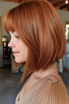 This year, bob haircuts are taking the fashion world by storm, and for good reason. Whether you prefer a sleek and polished look or a textured and edgy vibe, there’s a bob hairstyle out there Copper Brown Bob Hair, Ginger Bob Hair, Red Hair Bob Haircut, Copper Red Bob, Red Hair Bob, Paprika Hair Color, Red Bob Haircut