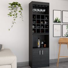 a room with a chair, table and wine rack