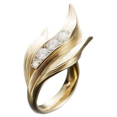 This contemporary Lily of The Valley Ring is made of 18 karat yellow gold and 4 round diamonds (0,65 carats). It has a sculptural shape. We use the best natural diamonds VS, F-G, we work with German gemstone companies that have been in business since the 19th century. The ring can be personalised with a name or a saying. Please allow us time to customize the ring. The ring can be ordered as usual fashion ring. The size and the colour of the gold can be changed. Sculptural Engagement Ring, Ring Sculpture, Modern Ring Design, Sculptural Ring, Time Jewelry, Art Jewelry Design, Round Sapphire, Contemporary Ring, Fine Art Jewelry