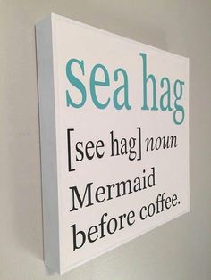 a sign on the wall that says sea hag see hag nom mermaid before coffee