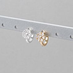 2PCS - Crystal Zircon Daisy Flower Huggie Hoops Earrings, Floral Huggies, Nature Minimalist Earrings, Real 14K Gold & Silver Plated [E0903] Item Details Measurement: 7.5 X 10.5mm Material: Brass, CZ Color: Real 14K Gold & Silver Plated Quantity: 2 Pieces Country of Origin : South Korea White Hypoallergenic Cartilage Earrings For Anniversary, White Minimalist Cartilage Earrings For Wedding, Minimalist White Cartilage Earrings For Wedding, Huggie Hoop Earrings, Daisy Flower, Huggies Earrings, Minimalist Earrings, Jewelry Earrings Hoops, Silver Gold