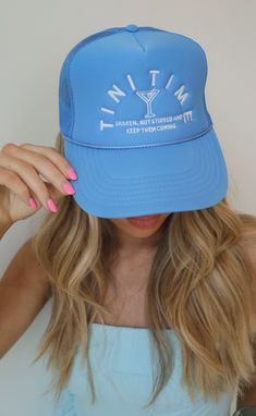 Preorder tees and sweatshirts ship out within 2-12 business days and preorder hats can take up to 15 business days to ship. 

It's always 'tini time! The perfect ocean blue trucker hat for cocktail hour, vacation or any fun event in between. We love the crisp white stitching featuring a tiny dirty martini! 

Use code BACH20 for 20% off an order of 6+ items from the bridal collection. Some exclusions apply. 

ALL HATS ARE FINAL SALE! Bachelorette Trucker Hat, Women Trucker Hat Outfit, Personalized Trucker Hat, Bachelorette Trucker Hats, Hat Business, Blue Trucker Hat, Bachelorette Hats, Pink Trucker Hat, Dan Post