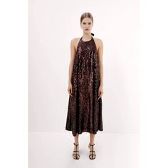 Zara Sequin Halter Dress 2712/306 Brown Size: Small New With Tags. Dress With Tied Halter Neck, Sequin Applique. Interior Lining. Size: Small Measures Flat Approx.: Armpit To Armpit: 15.75" Inseam: 28" Color: Brown | 2712/306 Outer Shell 100% Polyester Lining 100% Polyester * Except For Trimmings New With Tags. Zara Brown Sequin Halter Dress 2712/306 Small New With Tags. Summer Midi Length Sequin Dress, Summer Midi Sequin Dress, Spring Sequin Halter Dress, Summer Date Night Sequin Midi Dress, Summer Midi Length Sequin Dress For Date Night, Chic Sequined Dress For The Beach, Chic Sequined Beach Dress, Zara Sequin Dress For Spring, Zara Sequined Dresses For Spring