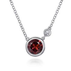 This timeless sterling silver necklace showcases a bezel set round garnet accented by a sensational round accent diamond. Elegant Custom Sterling Silver Necklace With Gemstone, Elegant Sterling Silver Gemstone Custom Necklace, Elegant Sterling Silver Custom Gemstone Necklace, Luxury Red Sterling Silver Necklace, Luxury Garnet Pendant Necklace, Timeless Sterling Silver Necklace With Bezel Setting, Sterling Silver Necklace With Polished Finish, Silver Birthstone Necklace For Formal Occasions, Elegant Silver Birthstone Necklace For Formal Occasions