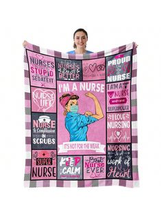 a woman holding up a pink blanket with nurse's words and phrases on it