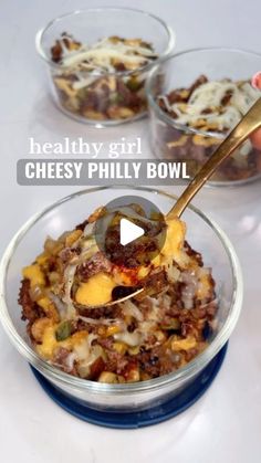 a bowl filled with cheesy philly bowl casserole on top of a table