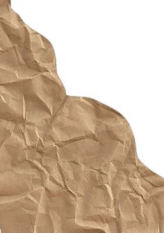 an animal made out of brown paper on a white background