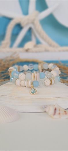 Beachy Style Handmade Bracelets White Coastal Style Bracelet For Gift, Coastal White Beaded Bracelets For Gift, Spiritual Stackable Beaded Bracelets For Beach, Spiritual Stackable Beach Jewelry, Spiritual Stackable Jewelry For The Beach, Beachy Strand Beaded Bracelets As Gift, Beachy Beaded Strand Bracelets As Gifts, Bracelets Seashell, Seashell Bracelet