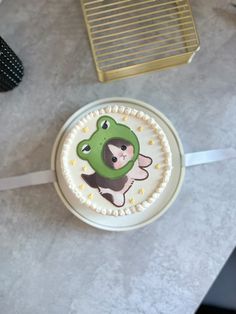 a decorated cake sitting on top of a table