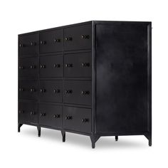 a black cabinet with brass knobs on the front and bottom drawers, against a white background