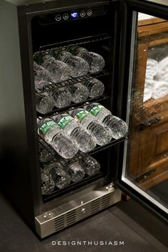 an open refrigerator filled with water and ice